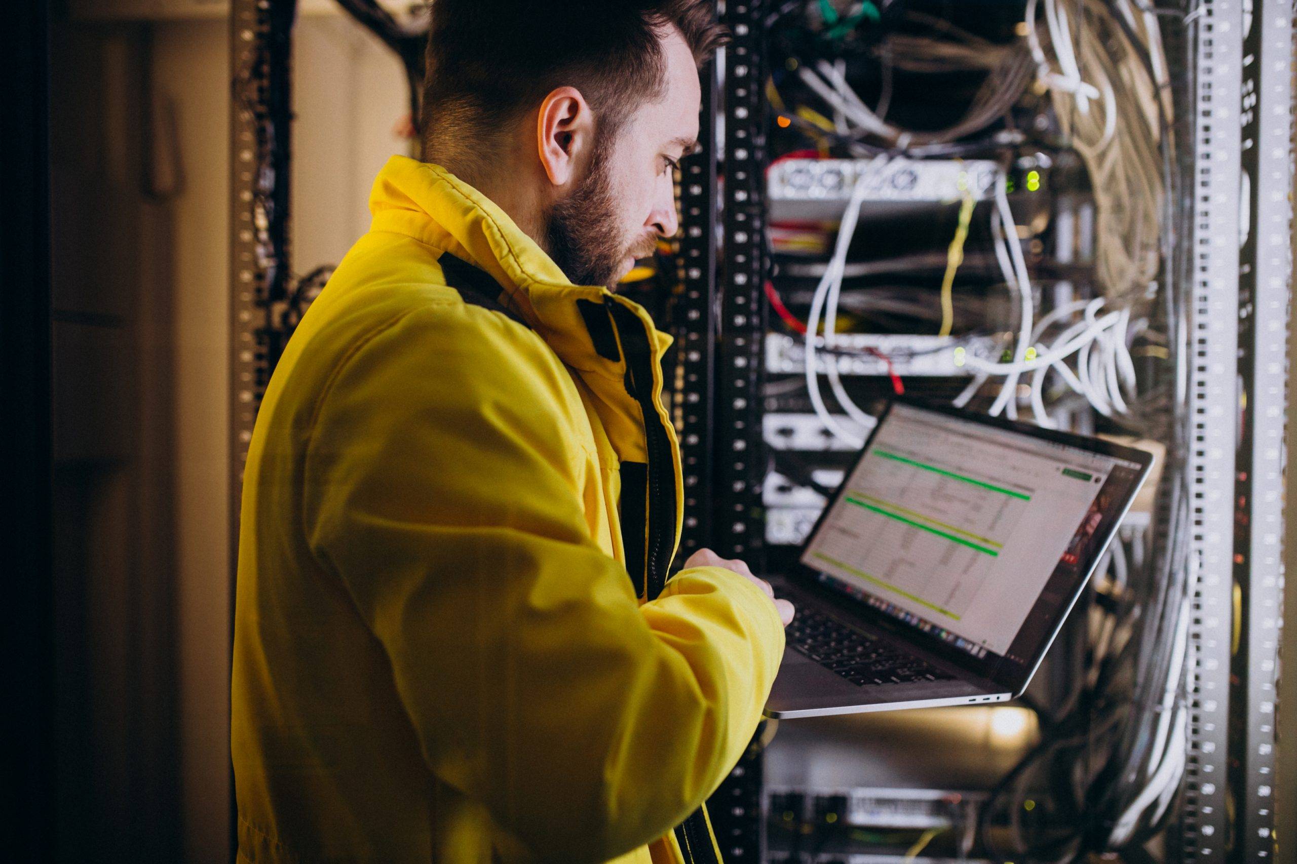Young Man Engineer Making Program Analyses Scaled