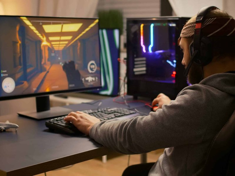 , Bismart Videogamer Winning First Person Shooter Tournament Using Rgb Keyboard And Professional Headphones Pro Player Man Talking With Other Players Online For Game Competition On Powerful Computer Scaled R4hotda9i0z3ta8npj03g3jnm2l7zx3dynr2uyeycw